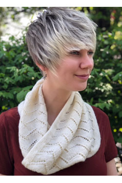 Easy lace cowl knitting pattern from Plymouth yarn in fingering weight.
